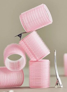 lot 2411 image: Ladies Pink Hair Curlers