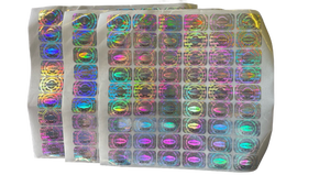 lot 16147 image: Holographic �Genuine� Security Labels Sheet - Retail $15