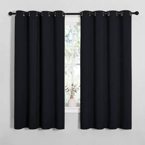 lot 2464 image: NICETOWN Blackout Curtain Panels for Bedroom, 2 Panels, W52 x L60-inch, Black, Thermal Insulated Grommet Top Blackout Draperies and Drapes for Basement - Retail $20