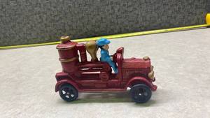 lot 1109 image: Vintage Cast Iron Fire Truck with Driver