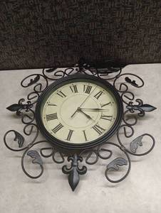 lot 27 image: Decorative Wrought Iron Wall Clock