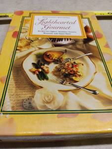 lot 94 image: Lighthearted Gourmet Cookbook and Music CD Set
