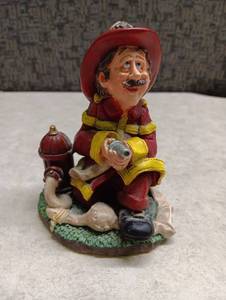 lot 107 image: Vintage Firefighter Figurine with Hydrant