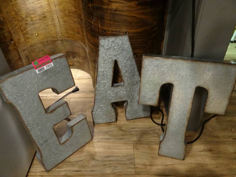 lot 7455 image: Corugated Metal Letters Spell Out-EAT