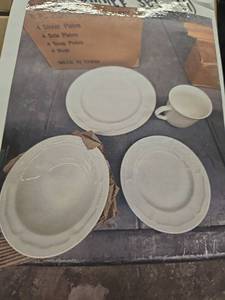 lot 8287 image: 16-Piece Embossed White Dinnerware Set