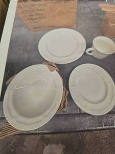 lot 8290 image: White Embossed Complete Dinner Set