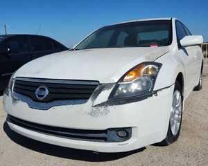 lot 1944 image: 2009 Nissan Altima - WHITE