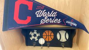 lot 41 image: 2016 Cleveland Indians World Series Pendant and Sports Coat Rack
