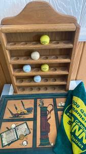lot 46 image: Golf Memorabilia Collection with Ball Display and Tournament Art
