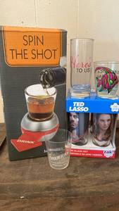 lot 104 image: Ted Lasso Mini Glass Set & Spin the Shot Game Bundle