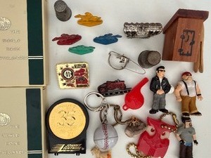 lot 513 image: Miniatures - Metal Cowboys, Wood Outhouse, Plastic Encyclopedia Banks and MORE