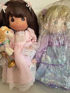 lot 543 image: Precious Moments Dolls on Stand
