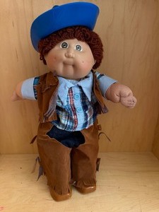 lot 577 image: Cabbage Patch Doll in Cowboy Clothes