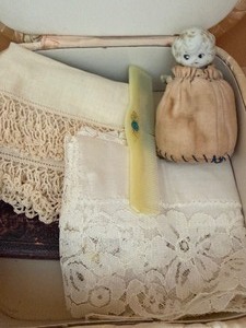 lot 594 image: Vintage Decor, Frame, Doll, Handkerchiefs in Satin Box