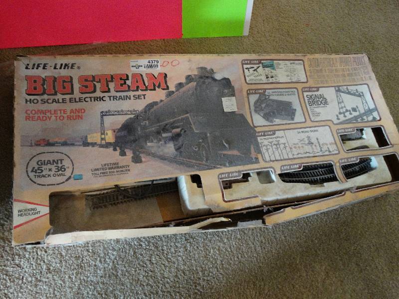 lot 4379 image: Life size big steam ho electric train set.