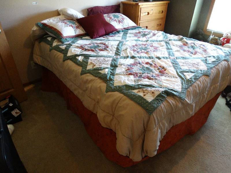 lot 4466 image: Full size bed on bed risers.