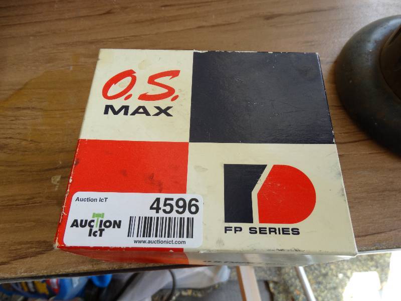 lot 4596 image: O.S. max fp series RC engine.