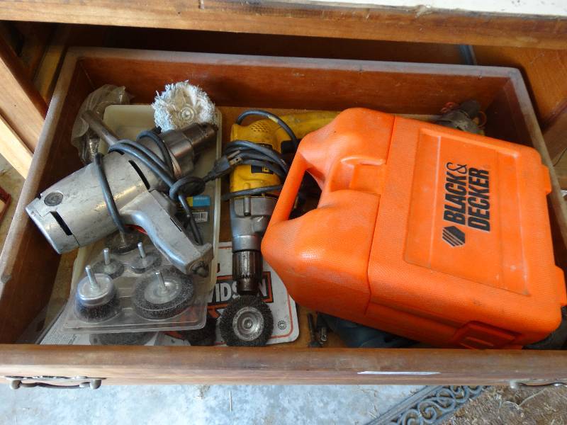 lot 4622 image: 4 Cord drills, wire wheels, & black & decker tool box missing tools.