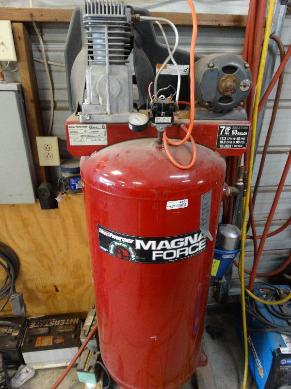 lot 4649 image: Coleman powermate magna force 7HP single stage 60gal air compressor 230volt.
