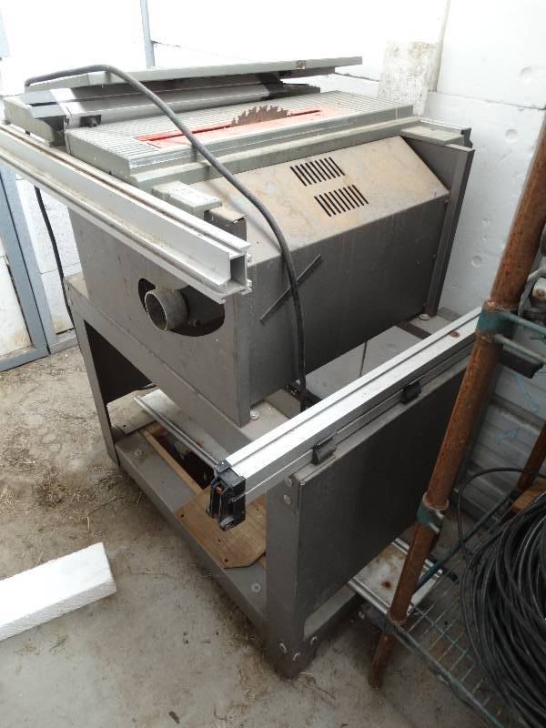lot 4743 image: Table saw wrolling stand.
