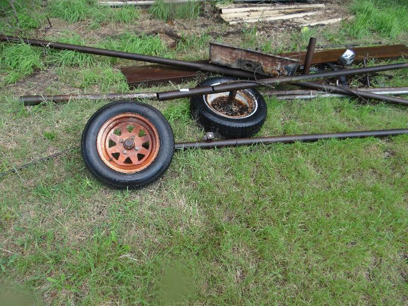 lot 13631 image: Metal pile with tires.