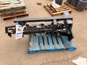 lot 87 image: IRLT - (Unused)- IRanch - Heavy-Duty Trencher Mini Skid Steer Attachment