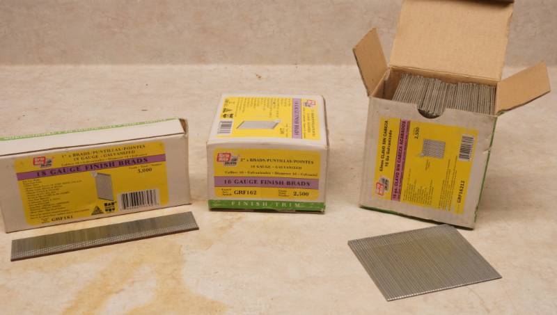 lot 1028 image: Lot of 2 boxes of Finish Brads - 1, 18 Gauge - 2,  16 Gauge, 2-12, 16 Gauge - Boxes are all NEW