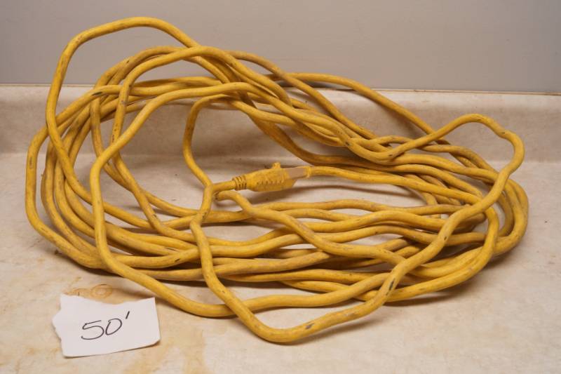 lot 1029 image: Nice, heavy Yellow Extension Cord - Believed to be 50