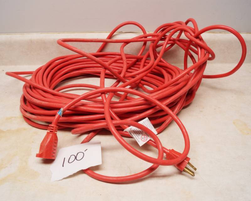 lot 1031 image: Nice, heavy Red-Orange Extension Cord - Believed to be 100