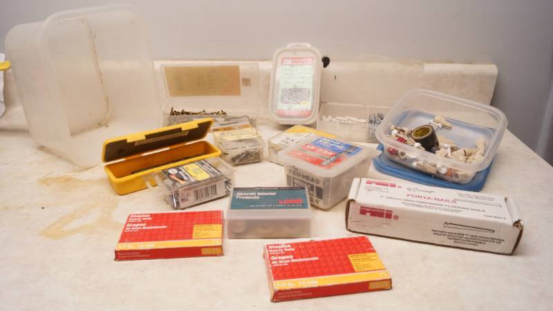 lot 1046 image: Lot of Hardwood Floor Nails (NEW), 2 boxes staples (NEW) and more new hardware items - see pics