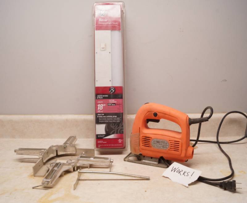 lot 1050 image: Variable Speed Jig Saw - powers on Fluorescent Light Fixture (appears NEW in package) and 2 corner braces