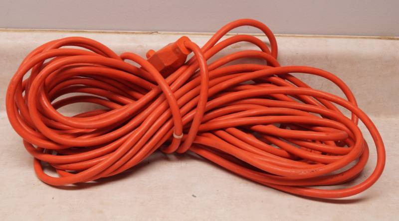 lot 1057 image: Nice, Orange Extension Cord - believed to be 50