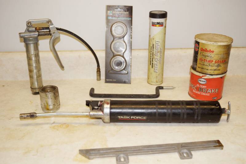 lot 1131 image: Lot of 2 Grease Guns - 1 mini - Grease Tube and Tubs - Trailer Bearings and more