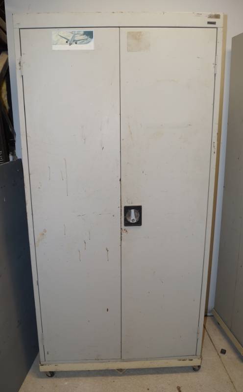 lot 1140 image: Sandusky Material Storage Cabinet - on heavy wheels - w contents - see pics - no key