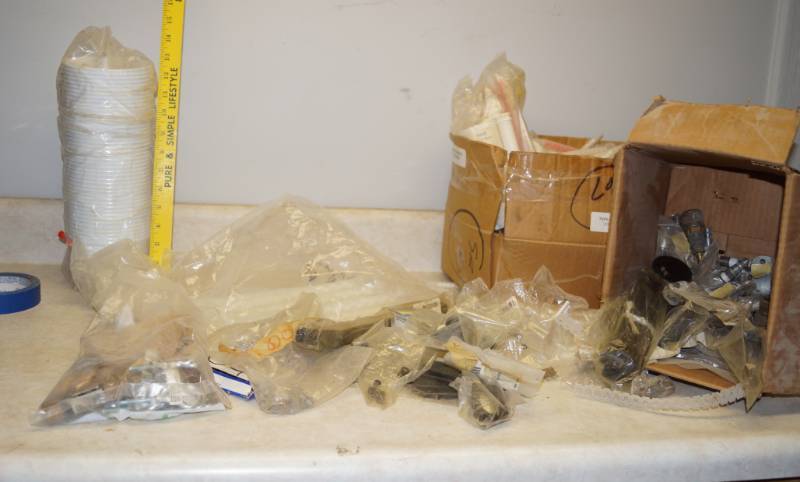 lot 1168 image: Lot of liquid Mixers and other hardware parts in bags