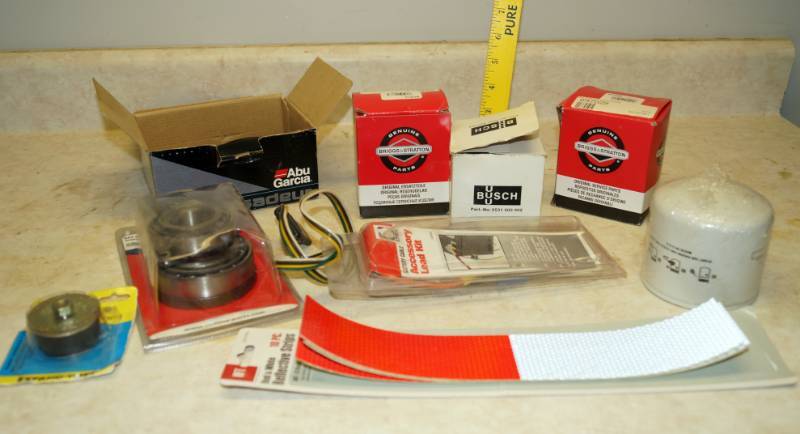 lot 1171 image: Lot of Oil Filters and Trailer Bearings and Reflective Stripes