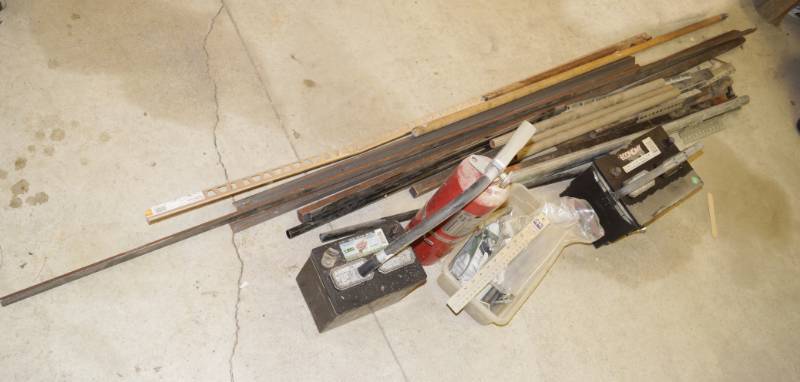 lot 1184 image: Lot of metal pipes, batteries, fire extinguisher and more