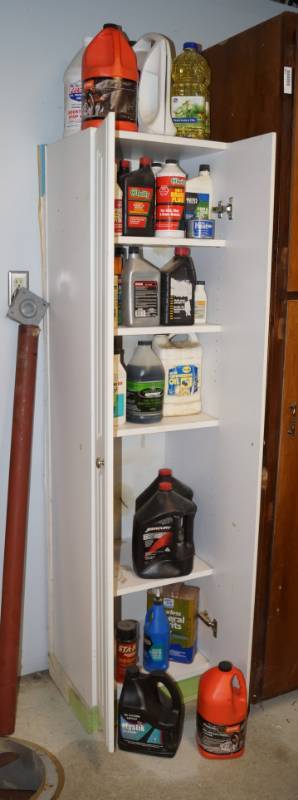 lot 1189 image: White Storage Cabinet FULL of Automotive Oils and Fluids - Most containers are full or nearly full - WOW