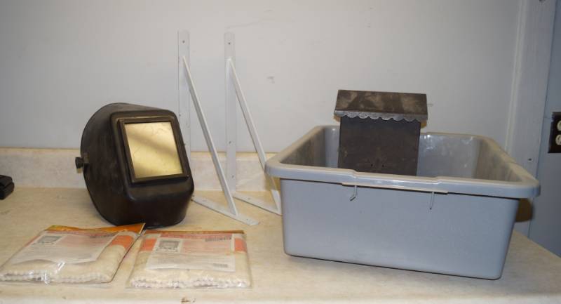 lot 1210 image: Welding Mask, Gray Restaurant Bus Tub, Mail Box