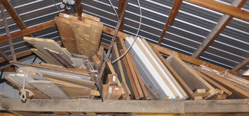 lot 1214 image: Lot of Wood and Doors in the Garage Loft - Your high bid takes it all