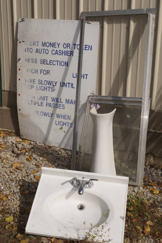 lot 1224 image: Lot of storm windows, sink top, pedestal and old metal car wash sign