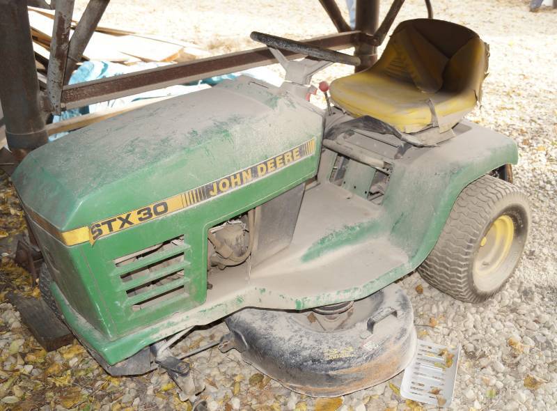 lot 1227 image: John Deere Riding Lawnmower STX 30 - project w some parts included see pics