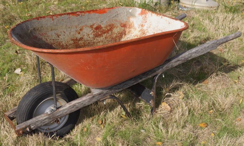 lot 1240 image: Red Wheel Barrow - Good front tire - great for the garden