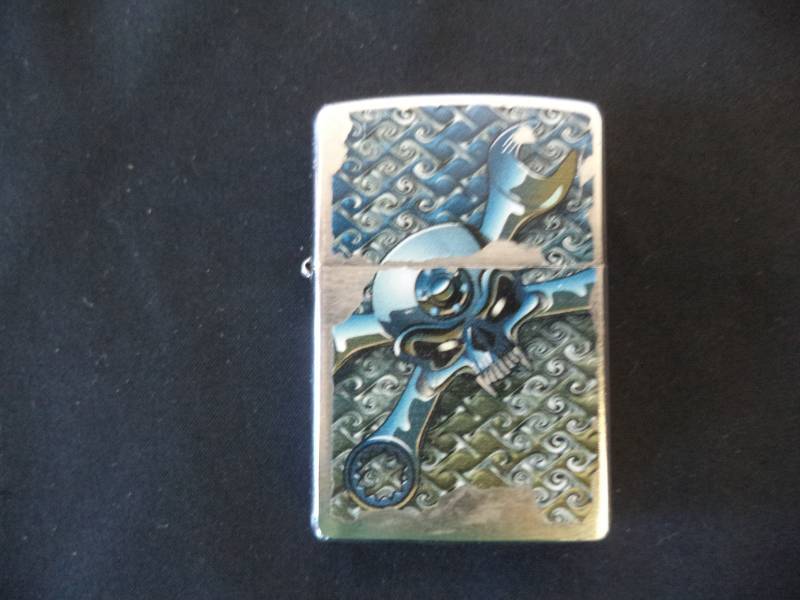 lot 2471 image: AWSOME Skull and Wrench Crossbone Zippo Lighter