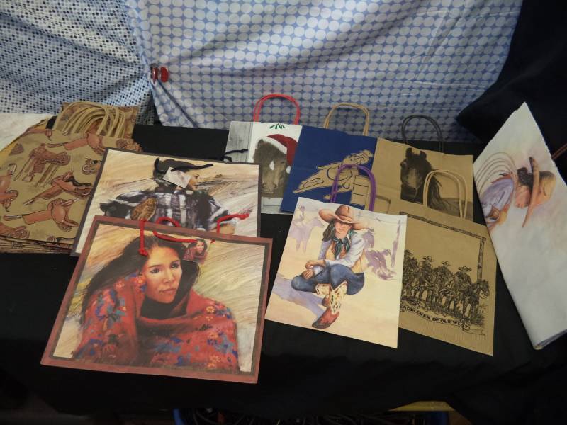 lot 2553 image: 16 Western gift bags. 12 Wrapping Papers, & 6 ornaments All New