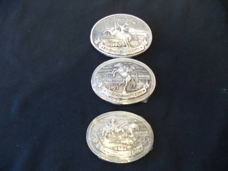 lot 2594 image: Pro Rodeo Hall of Fame 1990, 1993,1994, 3 Belt Buckles, Sealed