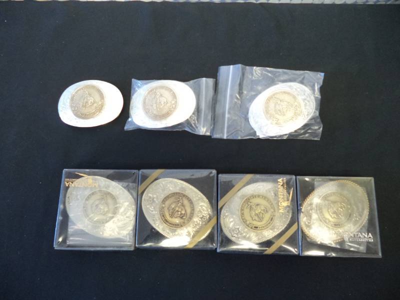 lot 2597 image: PRCA Associate Member Advocate Montana Silversmiths Belt Buckles- 1997, 1998, 2000, 2001, 2002, 2005, & 2007