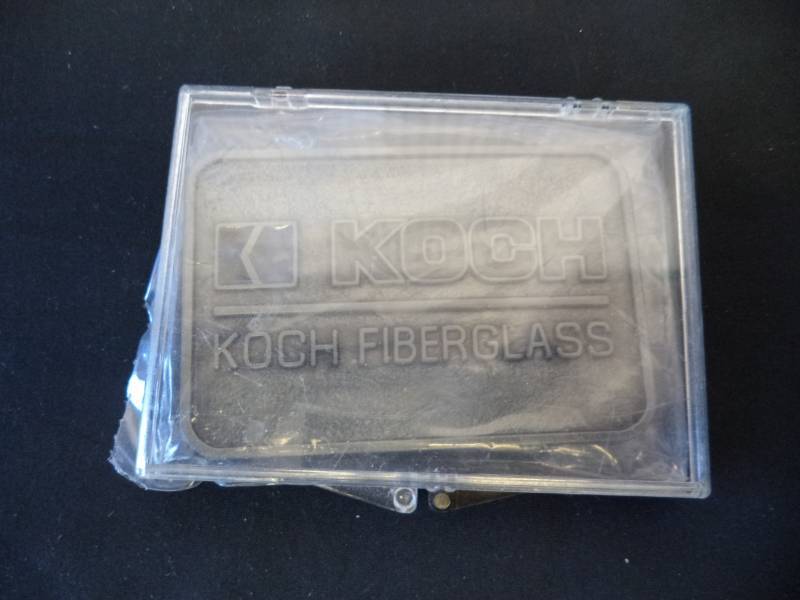 lot 2599 image: Koch Belt Buckle, Koch Fiberglass