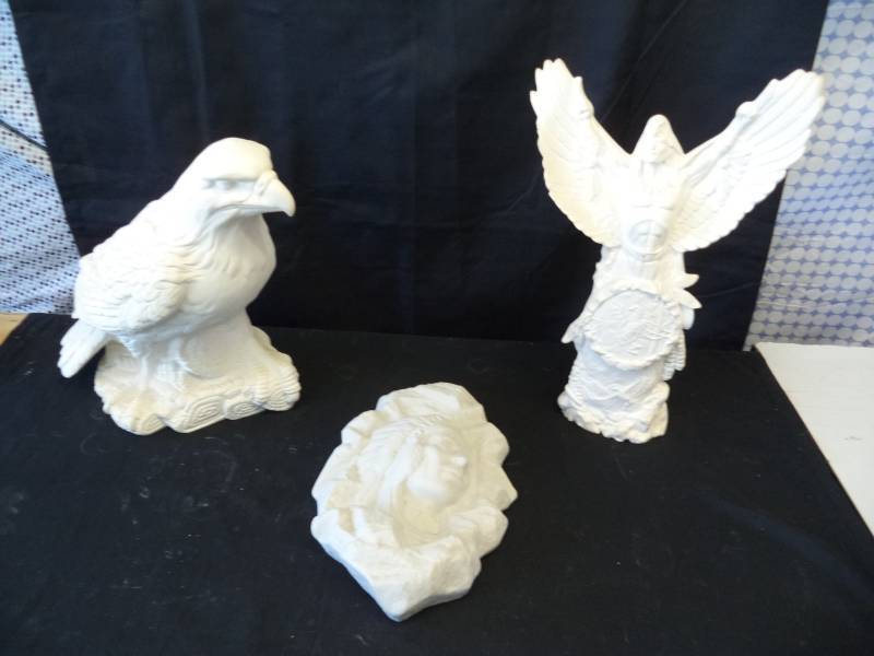lot 2690 image: Eagle & 2 Indian Ceramic Statues