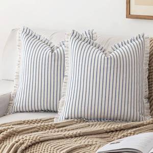 lot 2058 image: YEENAASY Throw Pillow Covers 18x18 Set of 2 Striped Fringe Pillow Cover Farmhouse Cushion Covers with Tassel Neutral Boho Pillows Decorative Square Pillowcase for Couch Sofa Bed, Blue - Retail $25